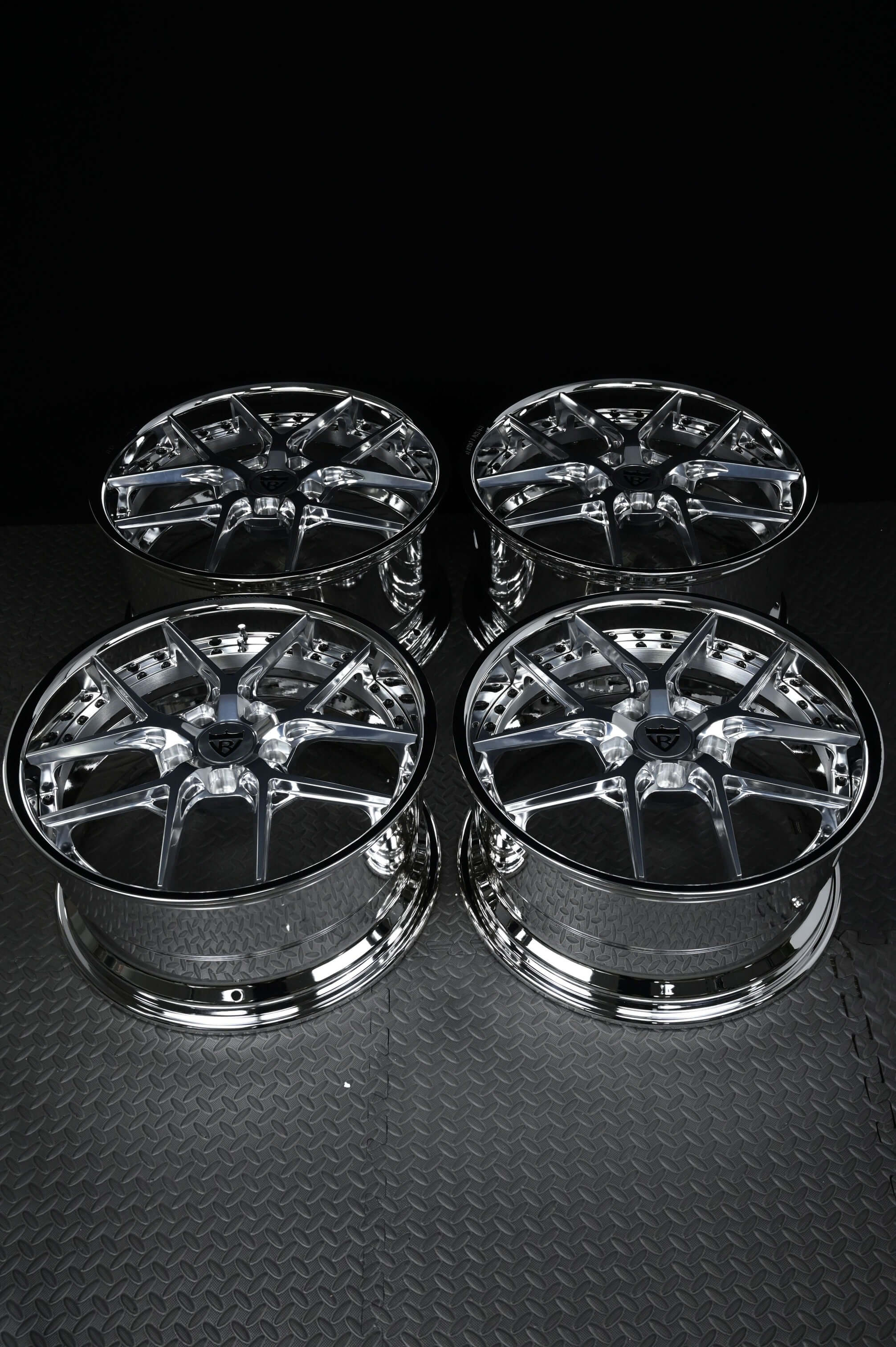 A set of 4 custom aftermarket wheels for 2000 Corvette C5 build with chrome and polished finish, 19/20 inch setup