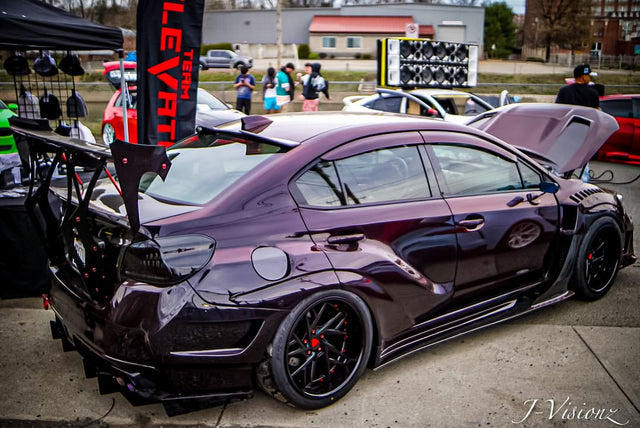 2017 Subaru WRX STI sitting on a set of super deep dish 19inch JDM custom wheels RV-DS74 on a car show