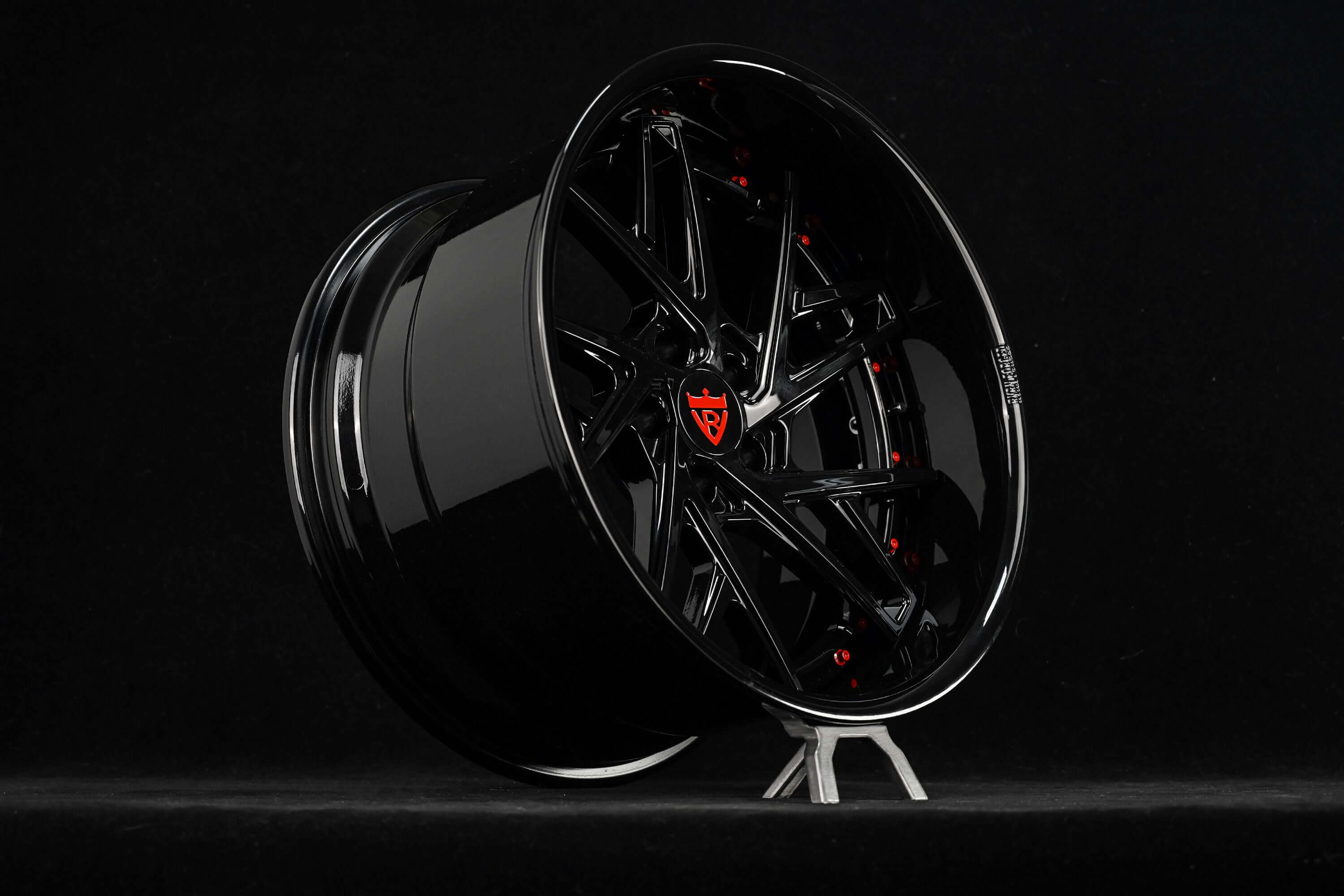 Black deep dish rims for Subaru STI, showcasing custom design and sleek finish, perfect for enhancing performance.