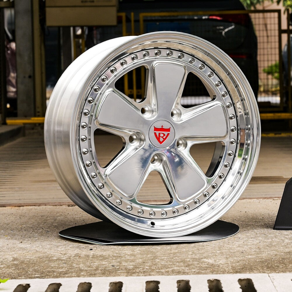 Custom forged 5 spoke deep dish wheel with polished finish, designed for Porsche 911 aftermarket upgrades.