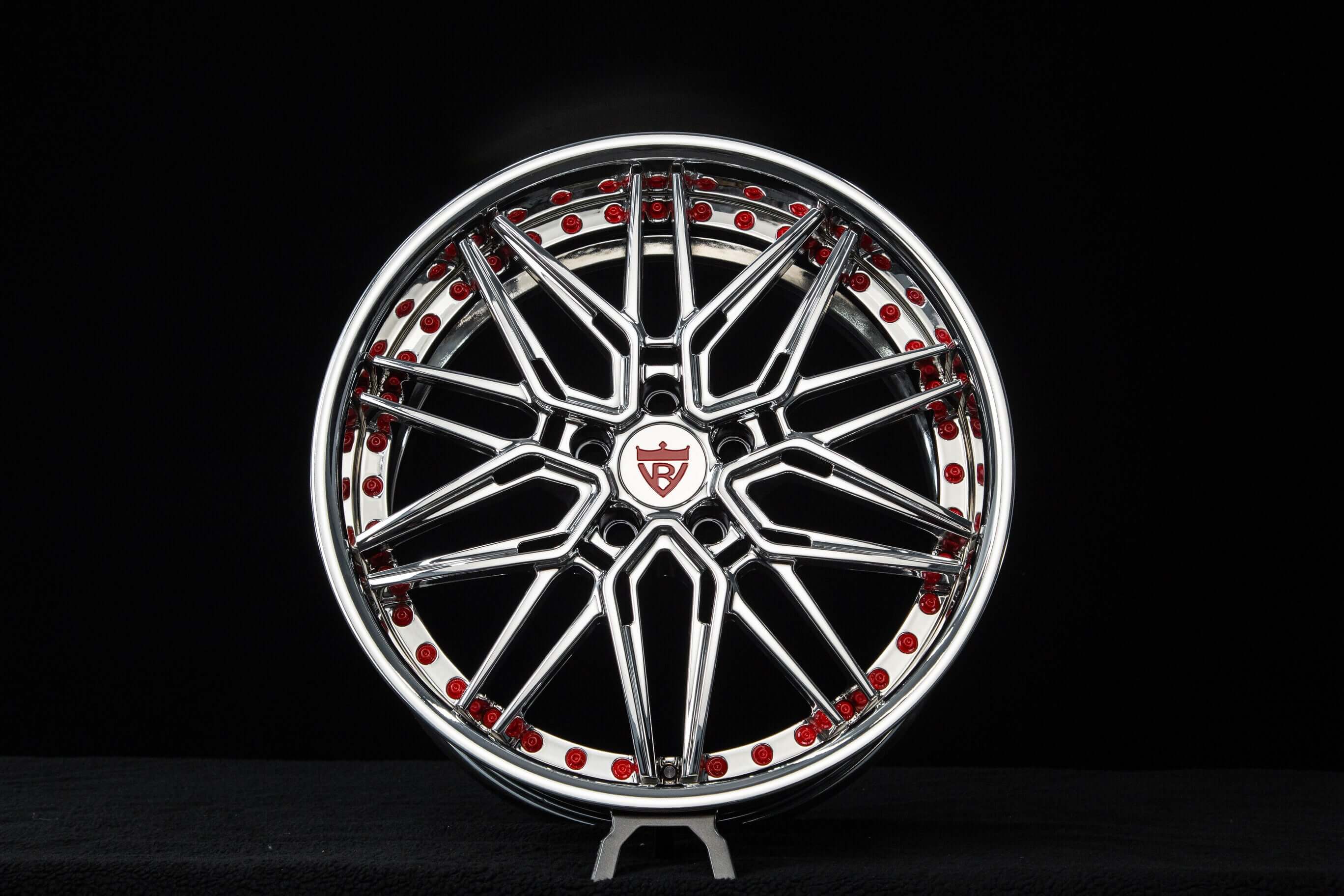 Chrome C5 Corvette wheel with red accents, perfect for aftermarket staggered 19/20 setups.