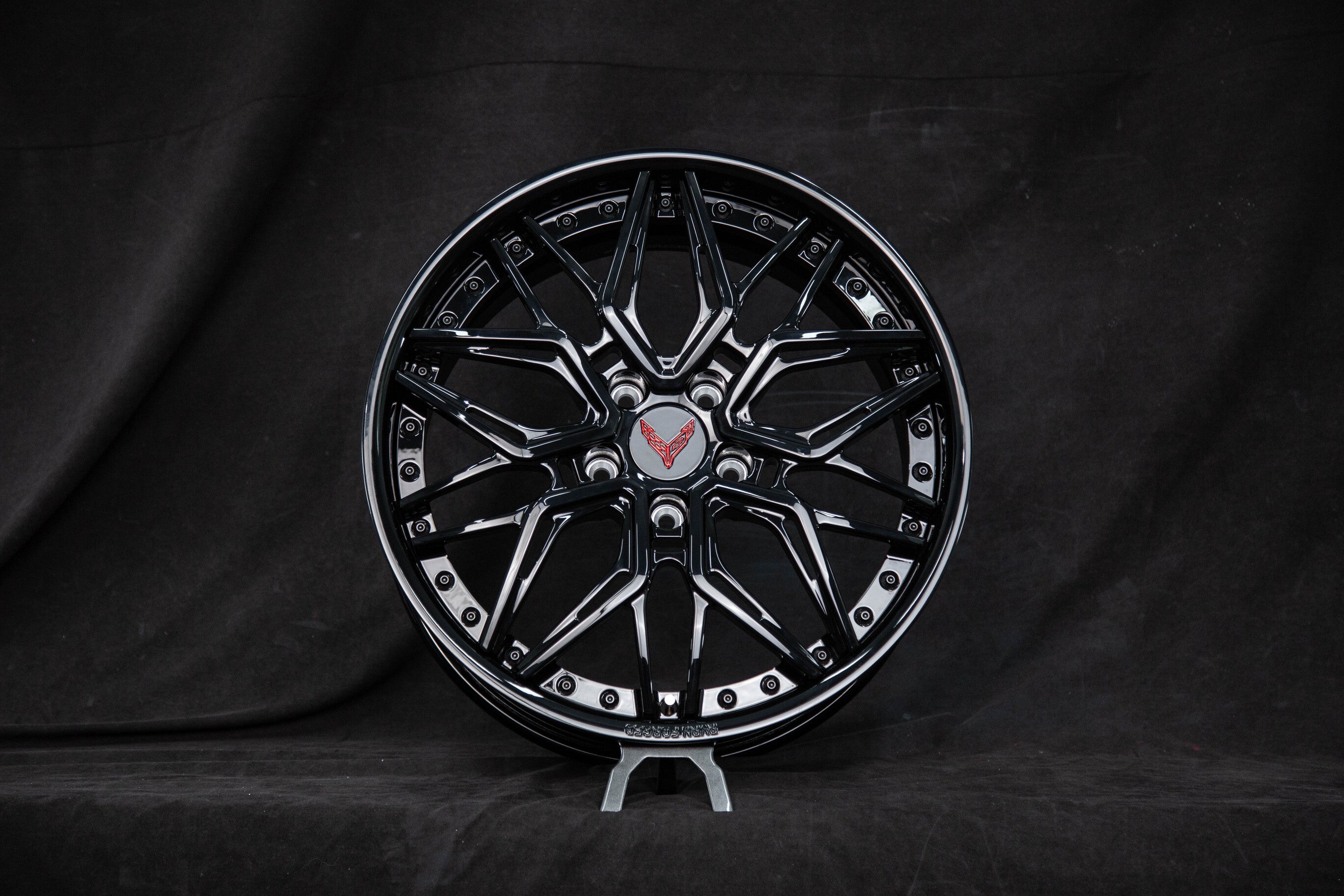 Black C8 Corvette custom wheel with deep dish design, showcasing modern style and performance for Corvette enthusiasts.