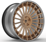 Custom forged 3-piece BMW RV-TR66 wheels in bronze and silver finish, showcasing intricate spoke design.