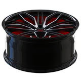 Custom black and orange RVRN forged monoblock wheel for various car models, featuring a sleek design and premium finish.