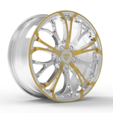 Custom polished gold and chrome rim, designed for show cars and luxury vehicles, showcasing unique and stylish features.