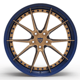 Luxury custom-built Aston Martin rims in a two-tone bronze and blue for enhanced aesthetics