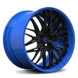 Custom blue forged Camaro wheels with black accents, designed for maximum concavity and compatible with OEM TPMS.