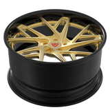 Custom forged 2-piece gold wheel for Cadillac CTS-V, showcasing a bold gold face and sleek black barrel.