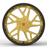 Custom forged gold wheel RV-DS74 with sleek black barrel, designed for Cadillac CTS-V performance and style.