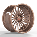 Custom forged deep dish aluminum rim with a unique bronze finish and intricate spoke design for trucks.
