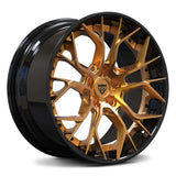 Custom aggressive forged wheels for Corvette, featuring a unique gold and black design, ideal for enhancing performance and style.