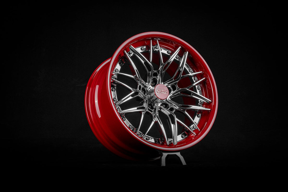 RVRN RV-C081 custom forged wheel with a red barrel and chrome multi-spoke face built for a 1963 Ford Galaxie 1/2.
