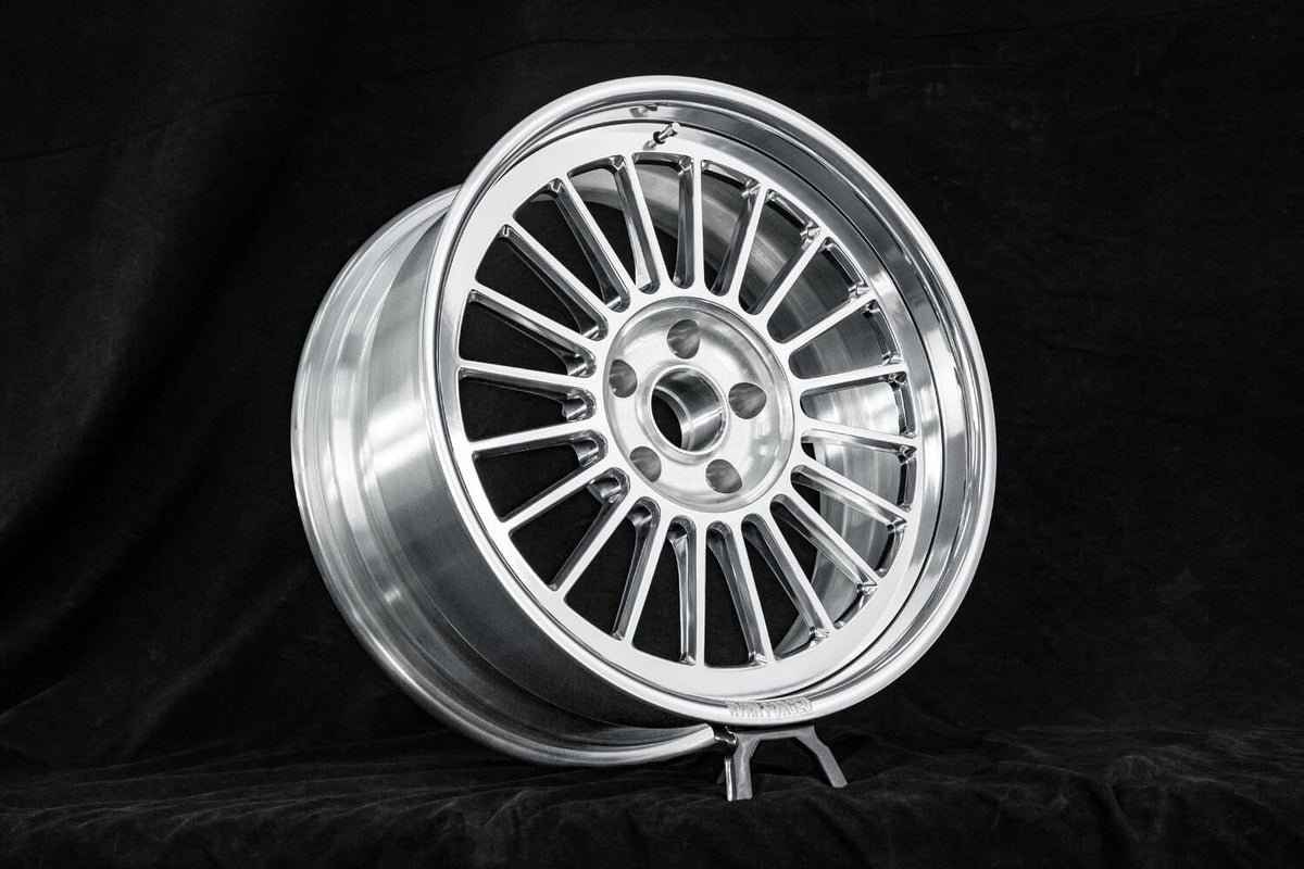 Polished aluminum RVRN RV-HR88 deep dish forged wheel built for a 1965 Lincoln Continental.
