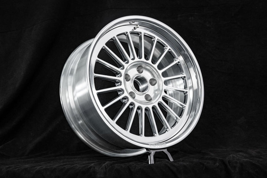 Polished aluminum RVRN RV-HR88 deep dish forged wheel built for a 1965 Lincoln Continental.