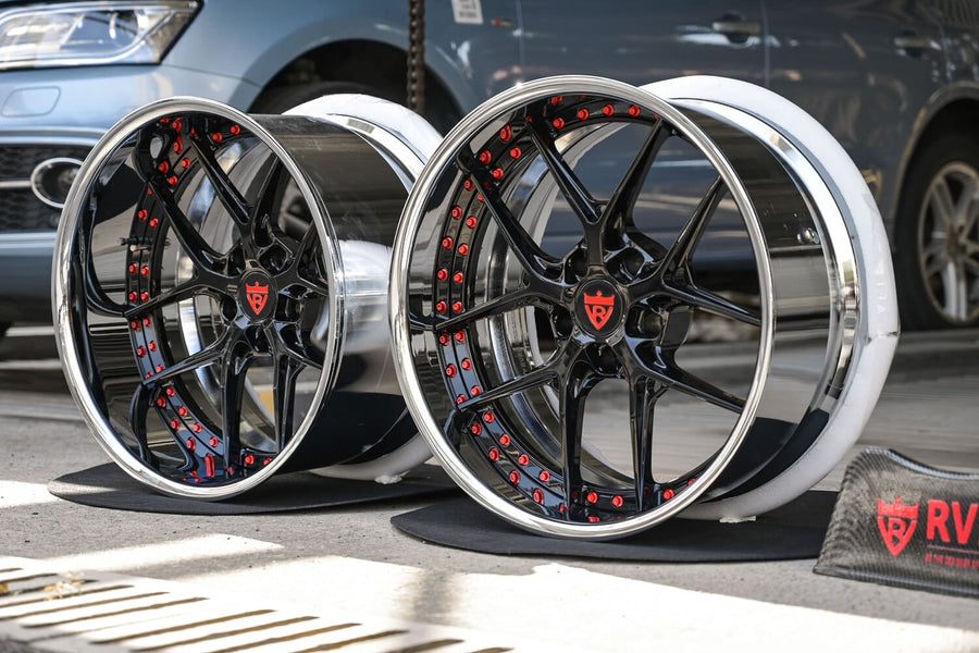 Pair of RVRN RV-DR08D gloss black forged wheels with red pinstripe accents and chrome lips for a 1969 Chevy C10.