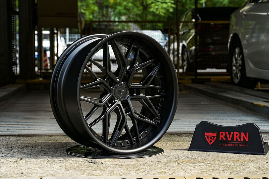 RVRN RV-T081 gloss black forged deep dish wheel built for a 1969 Chevy C10, photographed outdoors.