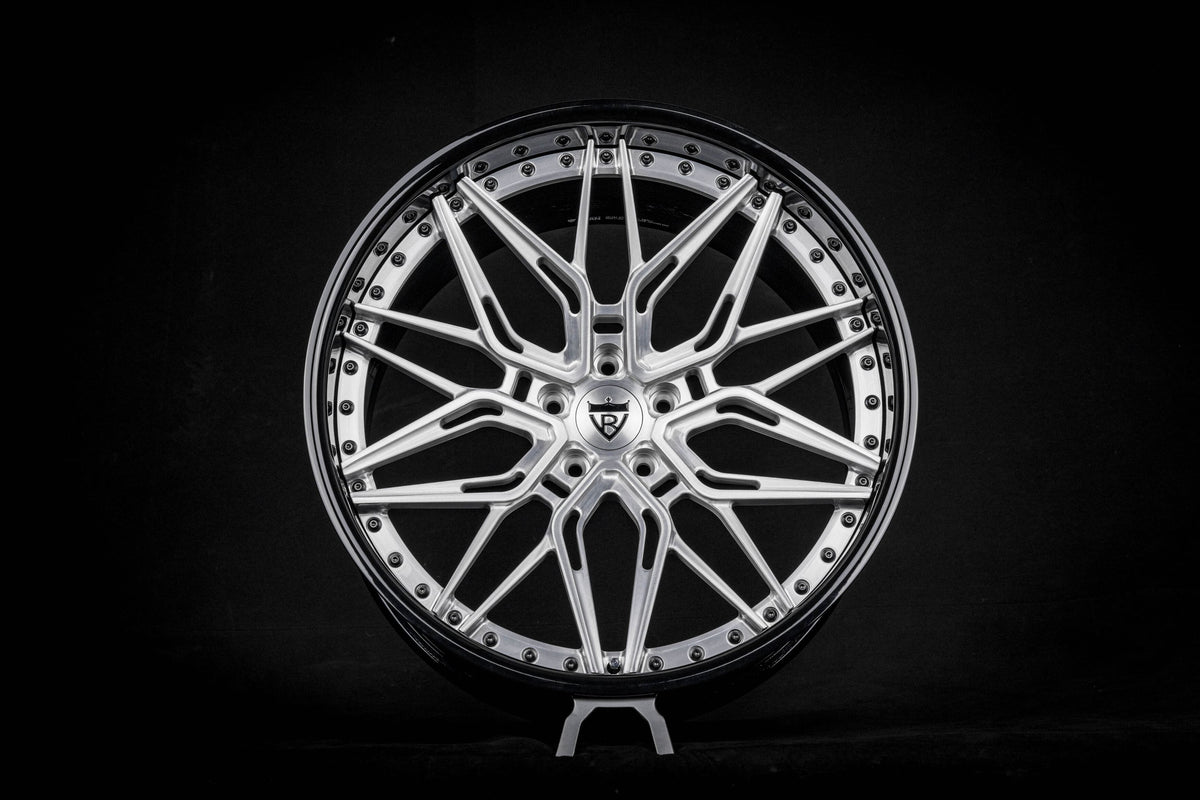 Brushed silver RVRN RV-T081 custom forged mesh wheel built for a 1980 Buick Regal, studio view.