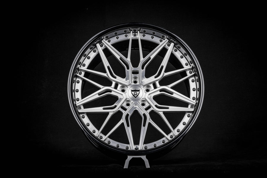 Brushed silver RVRN RV-T081 custom forged mesh wheel built for a 1980 Buick Regal, studio view.