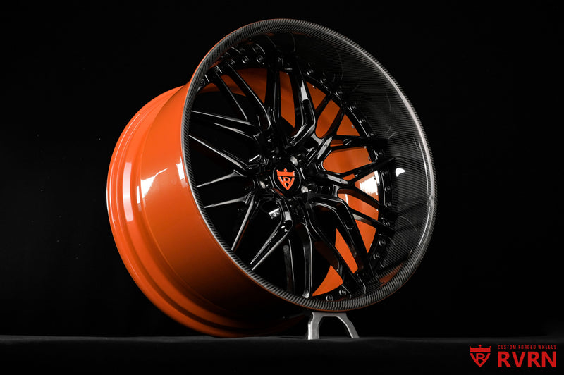 Front three-quarter view of a 2011 Bentley Continental GT SS on RVRN RV-T081 2-piece forged wheels featuring Orange barrels, Gloss Black spokes and Carbon Fiber wrapped lips, 22x10.5 front and 22x13 rear deep dish fitment.