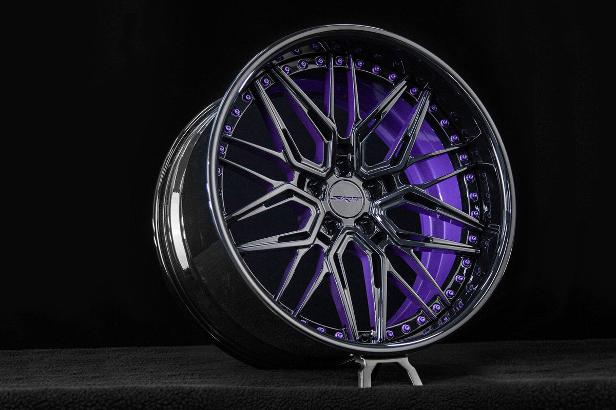 2011 Dodge Challenger Scat Pack Widebody Black & Purple Wheels:RV-T081 custom forged wheel close-up view with purple accents.