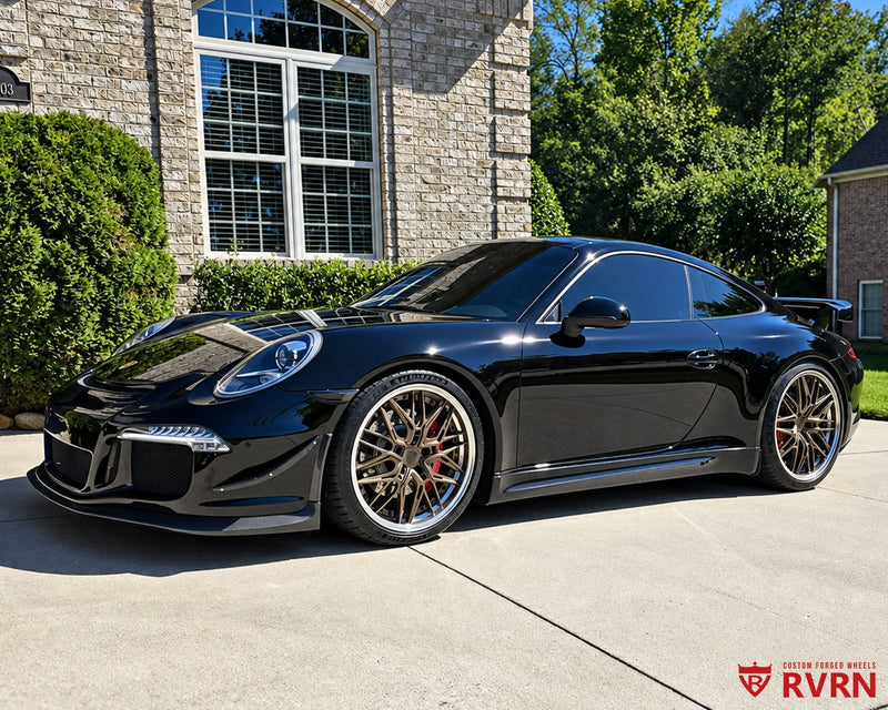 2012 Porsche 911 Carrera S on RVRN RV-T081 custom forged wheels in matte bronze with a polished barrel, front three-quarter view.