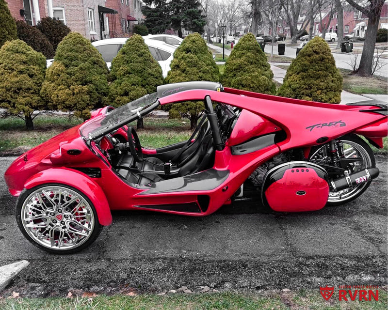 Side profile of a 2014 Campagna T-Rex 16S on RVRN RM-01 deep dish chrome custom forged wheels with 18x8 front and 22x11 rear fitment.
