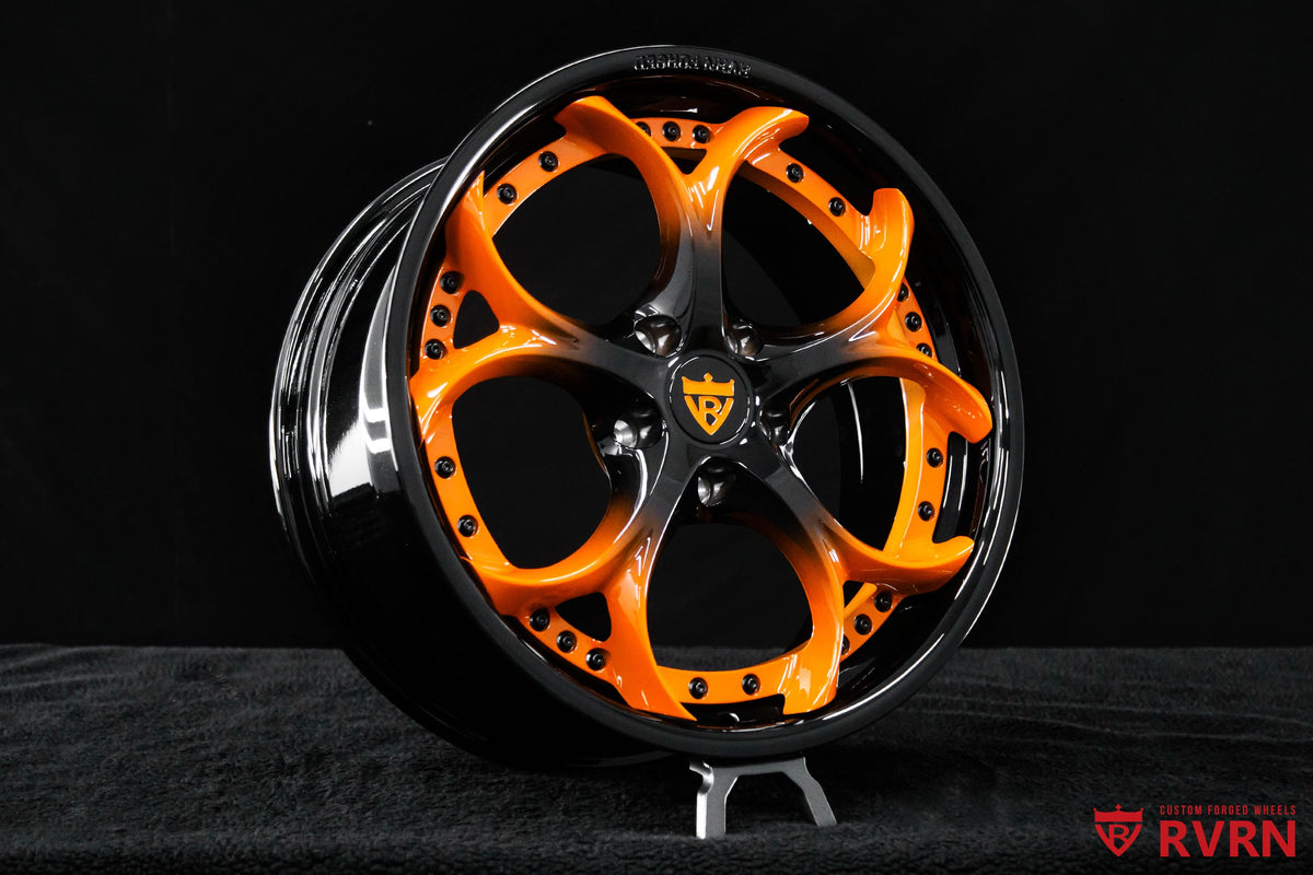 Gloss black RVRN RV-DS016 wheels for the Corvette C8 Stingray, featuring an orange and black spoke finish and custom 19x8.5 +38MM / 20x11 +48MM fitment