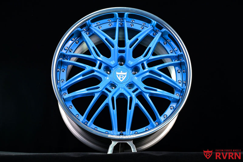 RVRN RV-T081 custom forged wheel detail for a 2023 Corvette C8 Stingray, combining polished aluminum and Rapid Blue finishes with 19x8.5 and 20x11 fitment