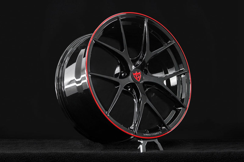 Center cap detail of RVRN RV-MR05 custom Corvette C8 wheels featuring precision-machined forged construction and Gloss Black with Gloss Red finish.