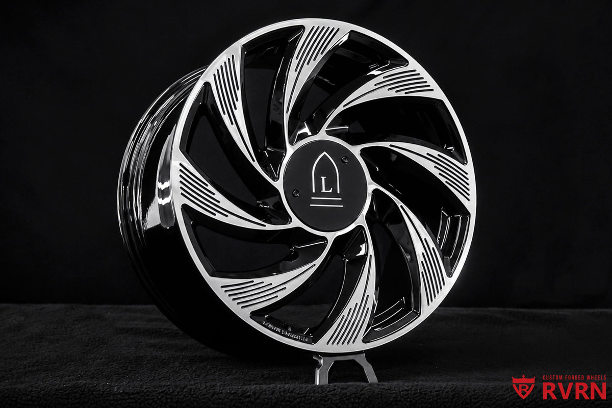Full product view of the RVRN RV-MY01 one-piece forged directional wheel in gloss black with machined face for Tesla Model Y custom builds.