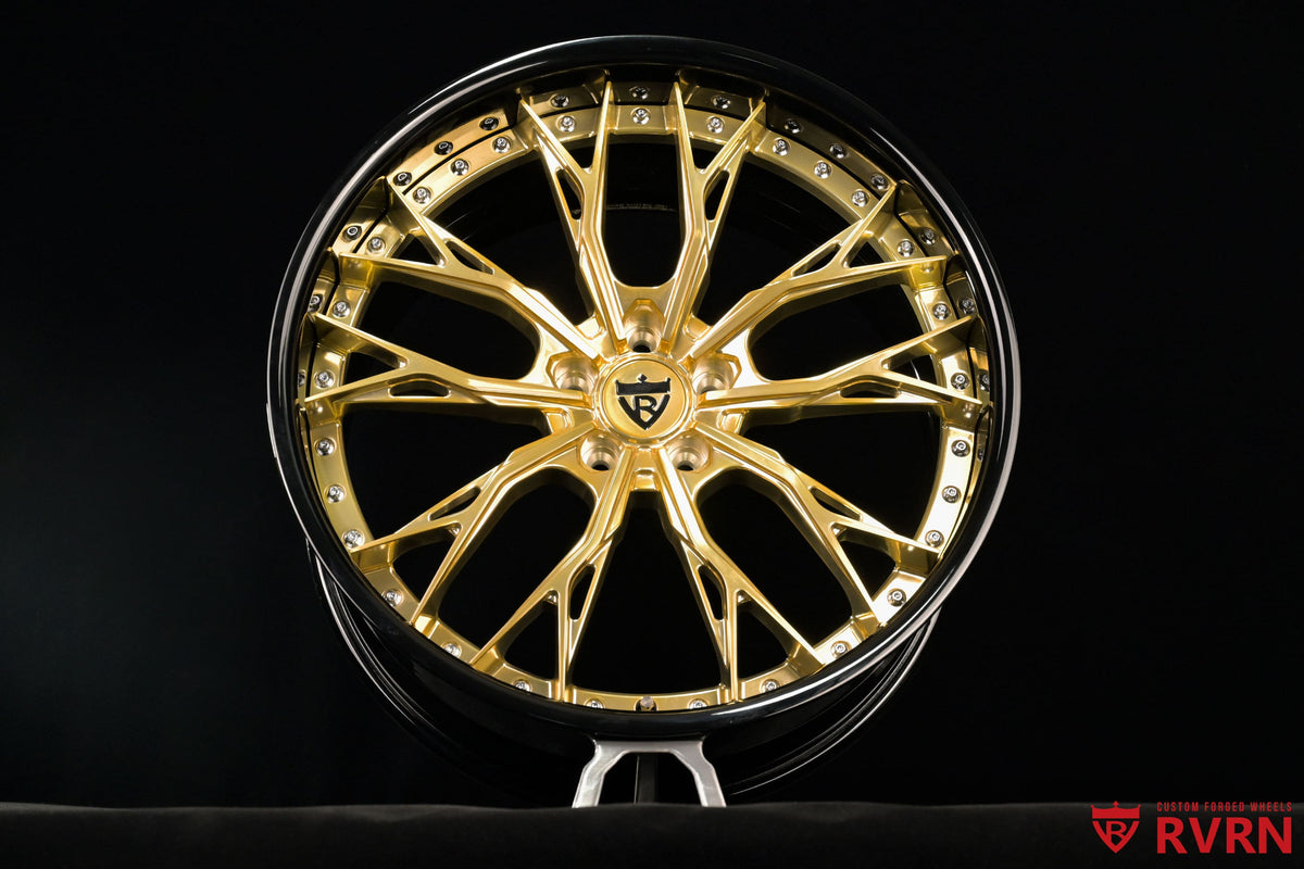 Complete RVRN RV-DC04 custom forged wheel set for Tesla Model Y Performance, showcasing Y-spoke rims, polished frozen gold spokes, gloss black barrel and 21x9.5 +30 and 21x10.5 +35 fitment