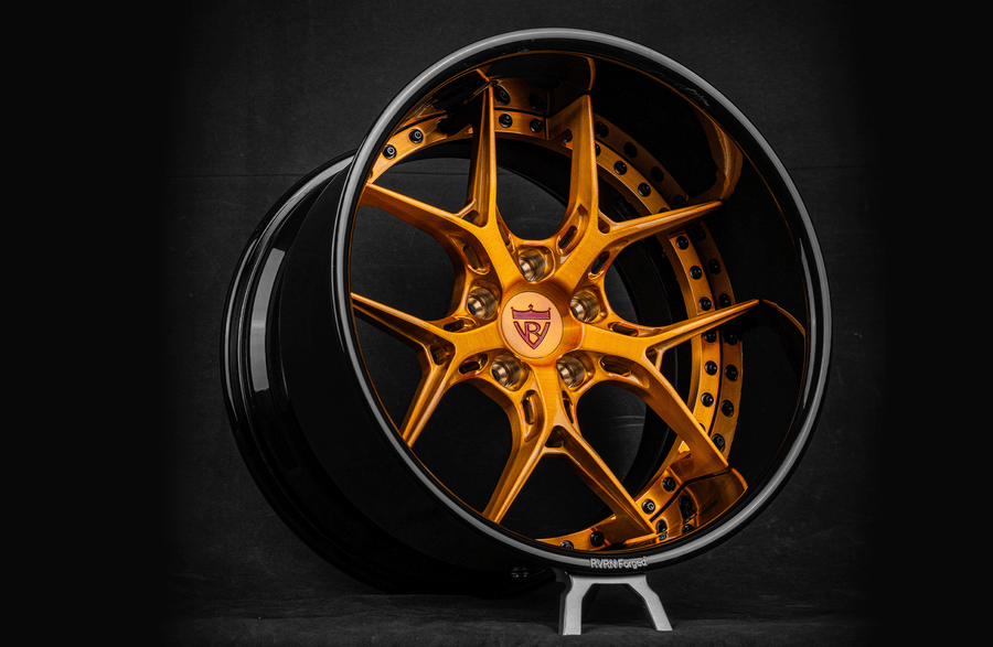 RV-DR08D two-piece forged wheel for a 1967 Chevy Camaro with dark gold spokes and a gloss black barrel, studio view