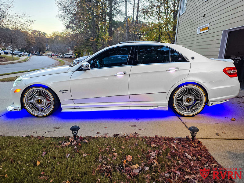 2011 Mercedes E350 W212 Base on RVRN Custom Wheels RV-DM05 parked with custom forged wheels and LED lights.
