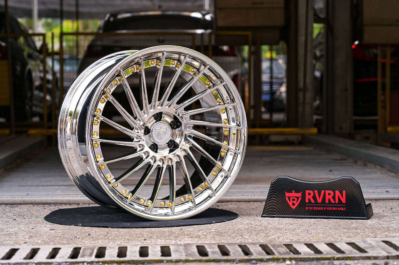 2007 Mercedes Benz CL600 Custom Deep Dish Chrome Forged Wheels: RV-DN01 displayed on pavement next to branded sign.
