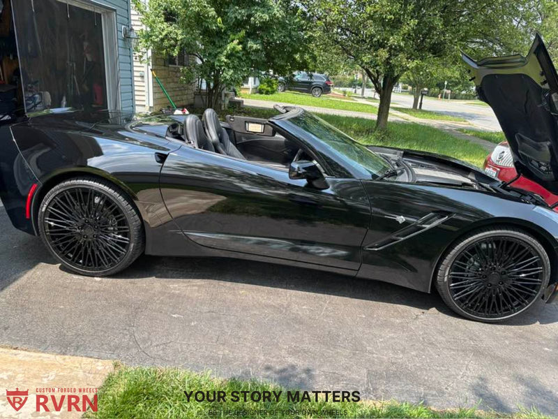 Black 2016 Corvette C7 Stingray sitting on RVRN Wheels 21X8.5J / 22X10J aggressive setup, all gloss black. 