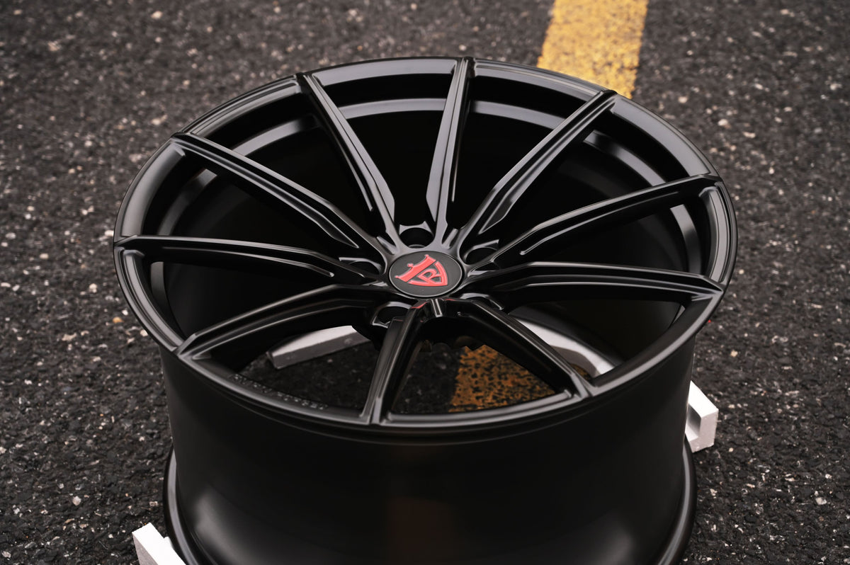 Black concave 22-inch wheel for 2022 Audi E-Tron GT showcasing stylish design and performance features.