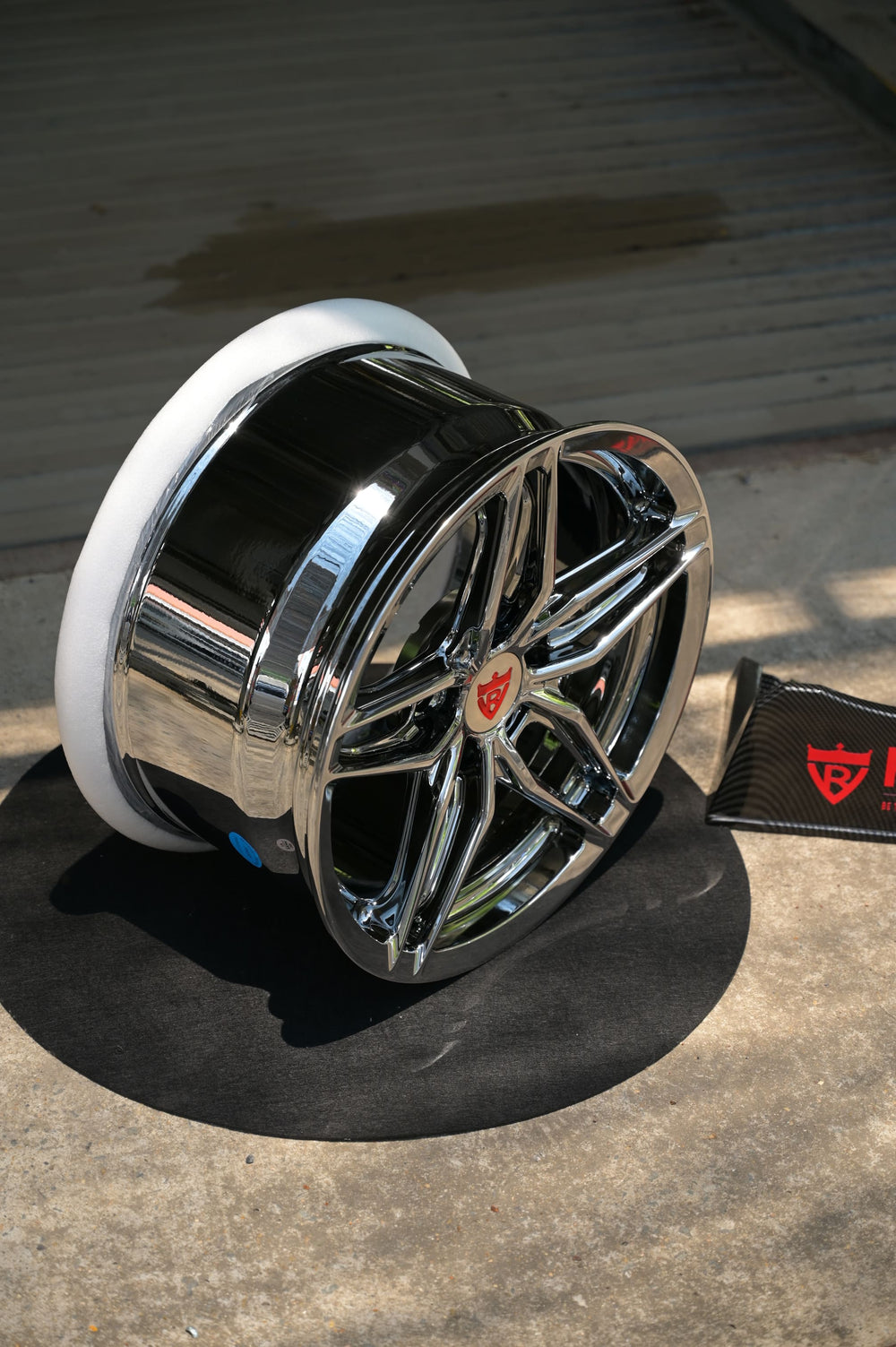 Close-up of custom forged chrome wheel for 1964 C2 Corvette