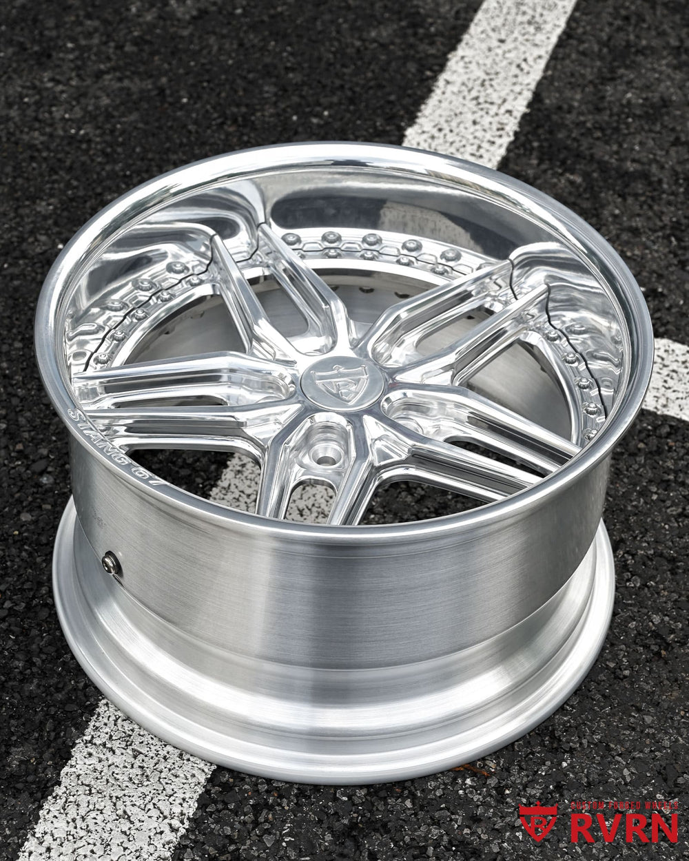 Close-up detail of RVRN RV-DP03 custom polished Mustang forged wheels showing precision-machined spoke profile and polished lip