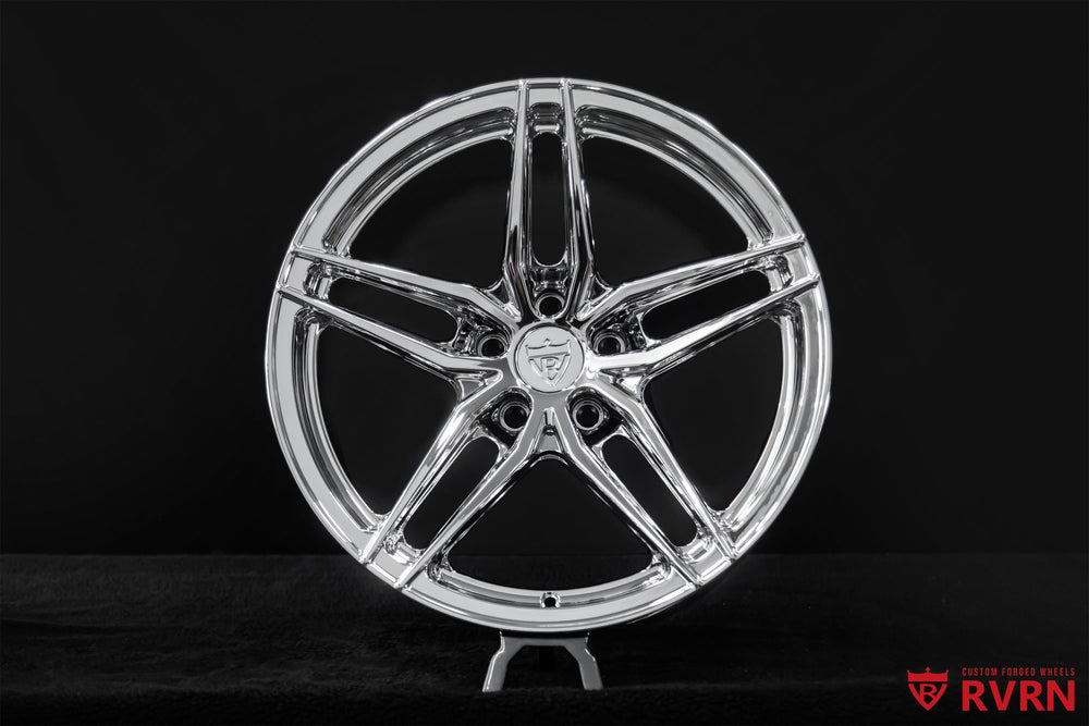 Detailed view of the chrome spokes on RVRN RV-MP03 custom Corvette C4 wheels featuring a clean 5-spoke structure.