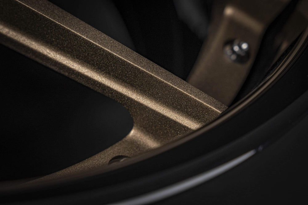  Detail shot of custom-forged matte bronze wheels for Chevelle