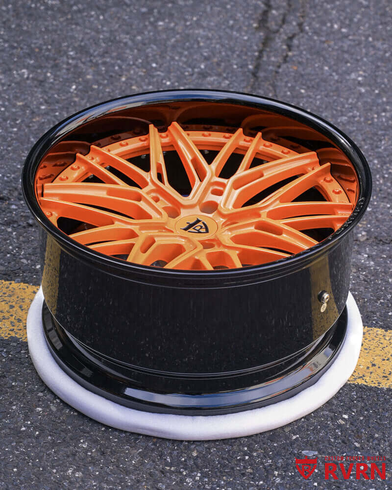 Orange color-match spokes with gloss black barrel on Dodge Charger wheels