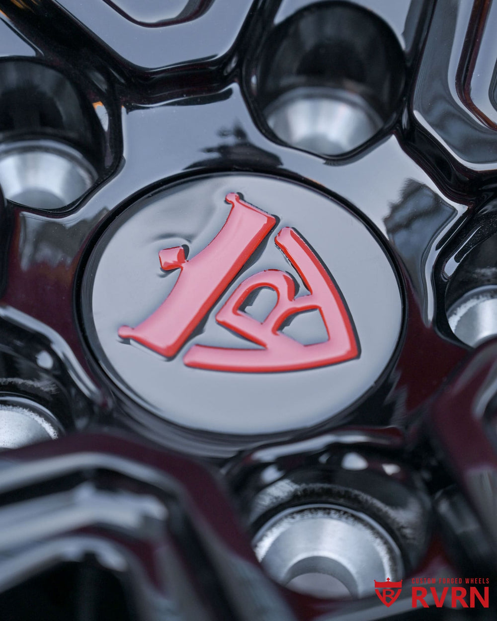 Gloss black spokes on RVRN RV-T081 forged wheels, highlighting precision machining and aggressive deep dish styling