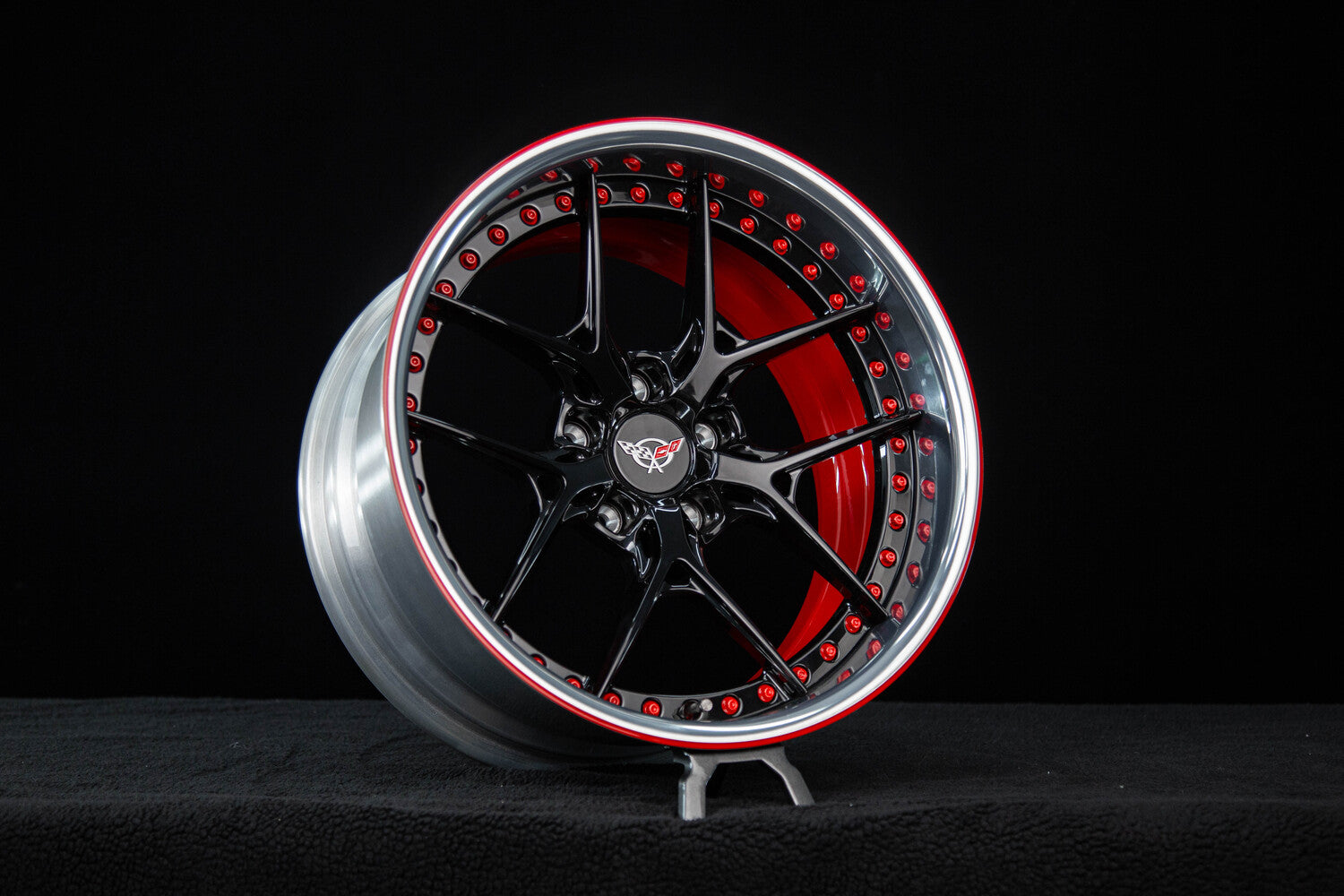 Front angle view of 1971 C3 Corvette custom wheels with gloss black spokes