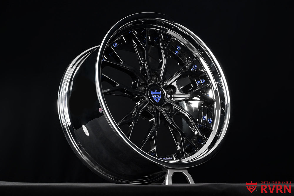 Angled face detail of RVRN RV-DC04 deep-dish Y-spoke custom forged wheels for the 1971 Oldsmobile Cutlass S, revealing the spoke shape, gloss black finish and chrome barrel in 19x8.5 front and 20x10 rear sizes.