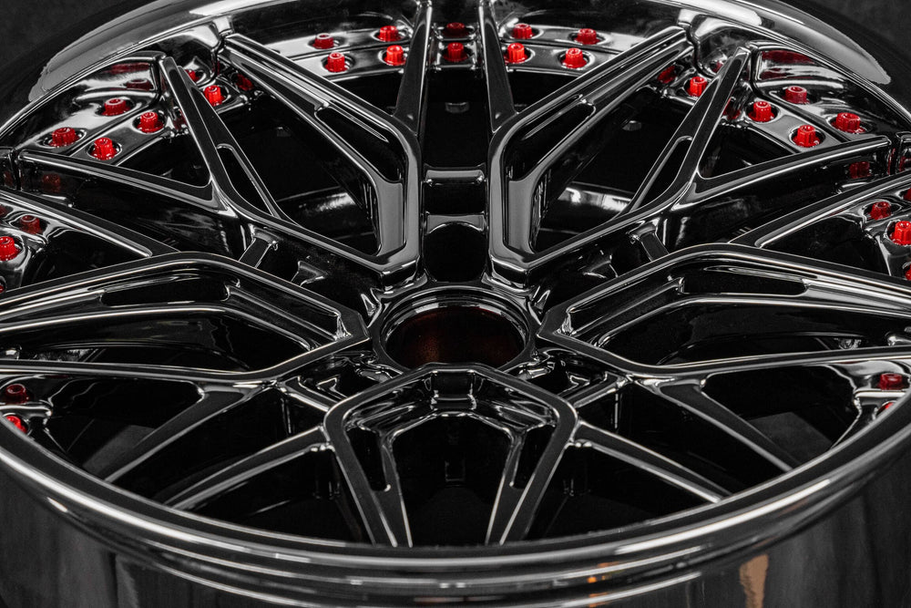 Close-up of RV-T081 black chrome & red two-piece Corvette wheels.