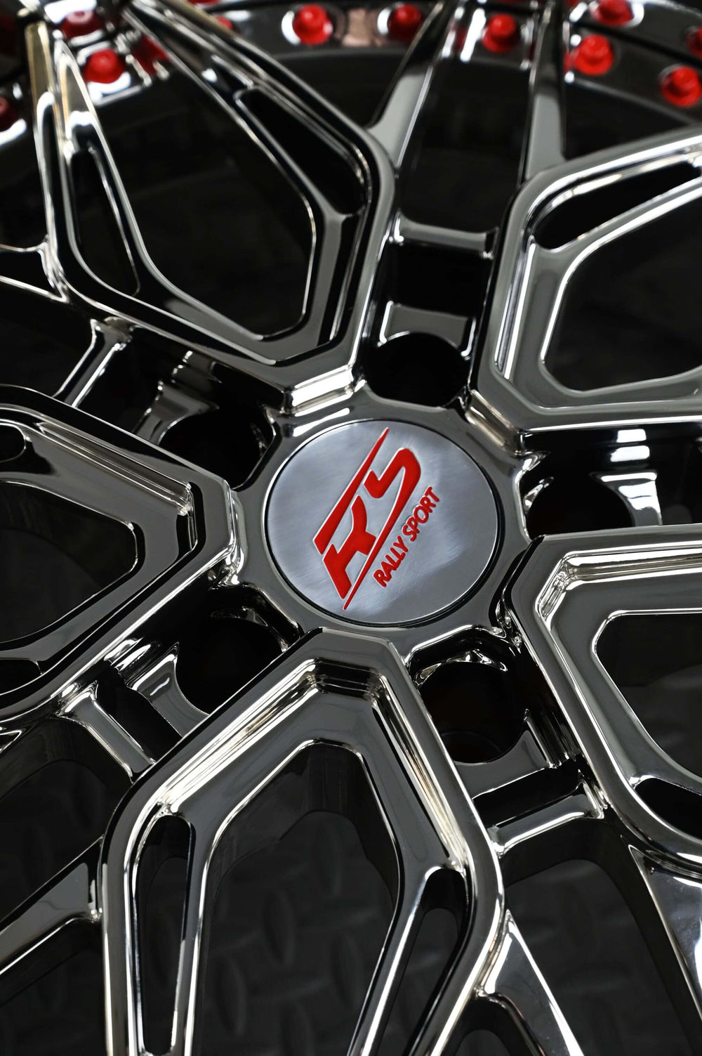 Dynamic low-angle shot of deep dish wheels installed on Camaro