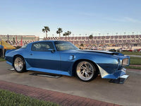 RVRN logo on 19-inch RV-DS74 wheels installed on blue 1965 Firebird Trans Am