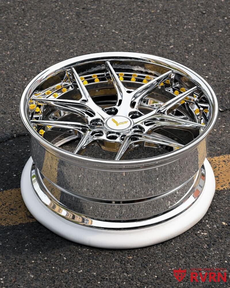 Close-up of polished deep lip chrome wheels on C4 Corvette