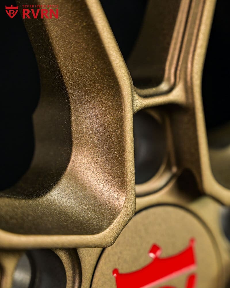 Close-up of RV-DB082 matte bronze lip and spoke design