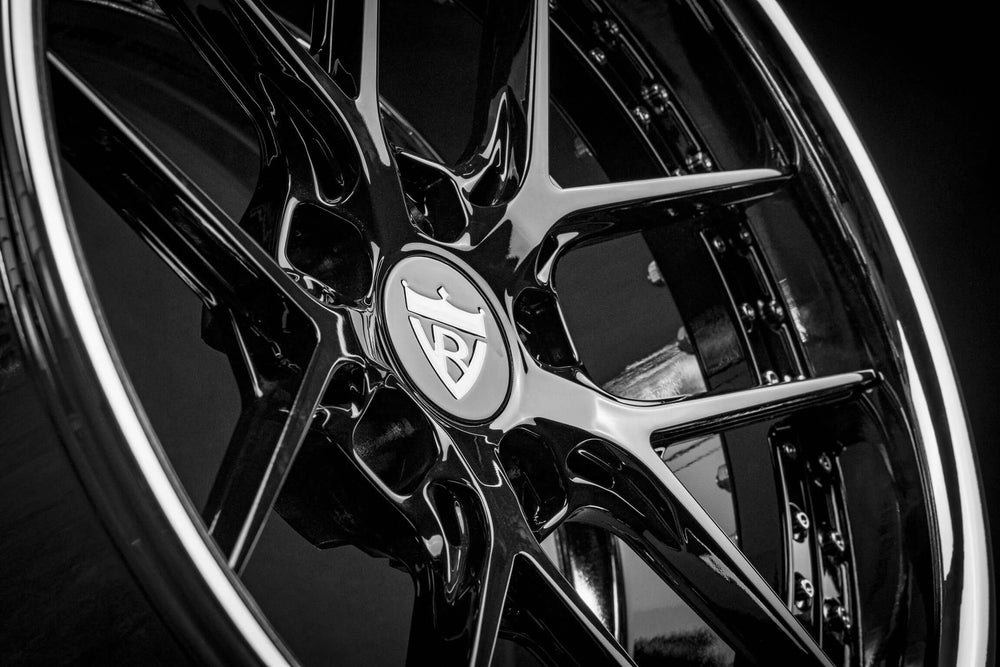 Black custom wheels for 1994 Mustang GT500, featuring sleek design and premium finish for enhanced performance and style.